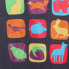 Close-up of the main graphic on the Vintage 2010s Phoenix Children's "Colorful Animals Grid" T-Shirt - M