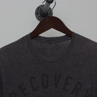 Close-up of the collar and tag on the Vintage Y2K Graphic "Recovery Day" T-Shirt - S