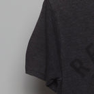 Close-up of the Left sleeve on the Vintage Y2K Graphic "Recovery Day" T-Shirt - S