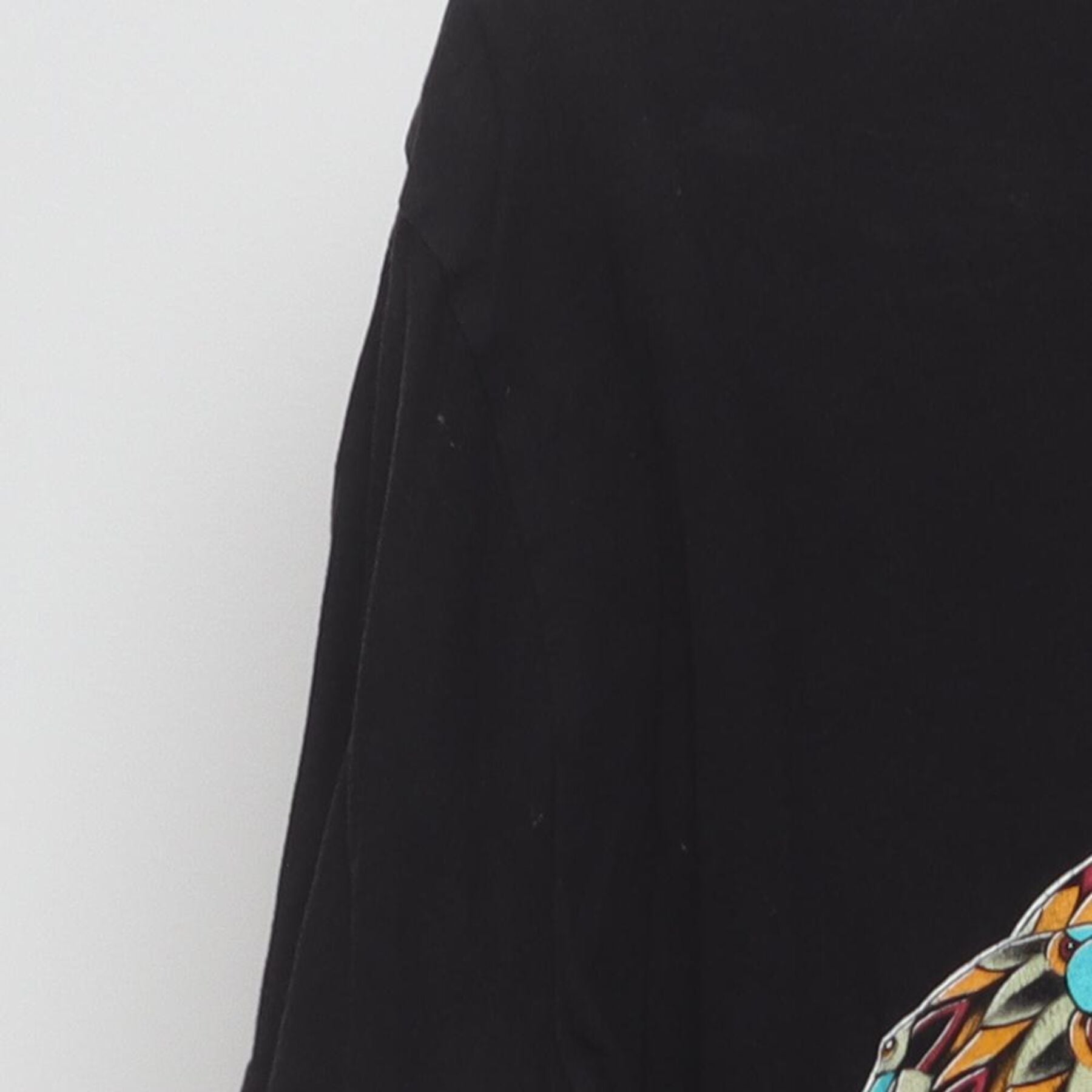 Close-up of the Left sleeve on the Vintage 2010s Riot Society "Roaring Gorilla" T-Shirt - L