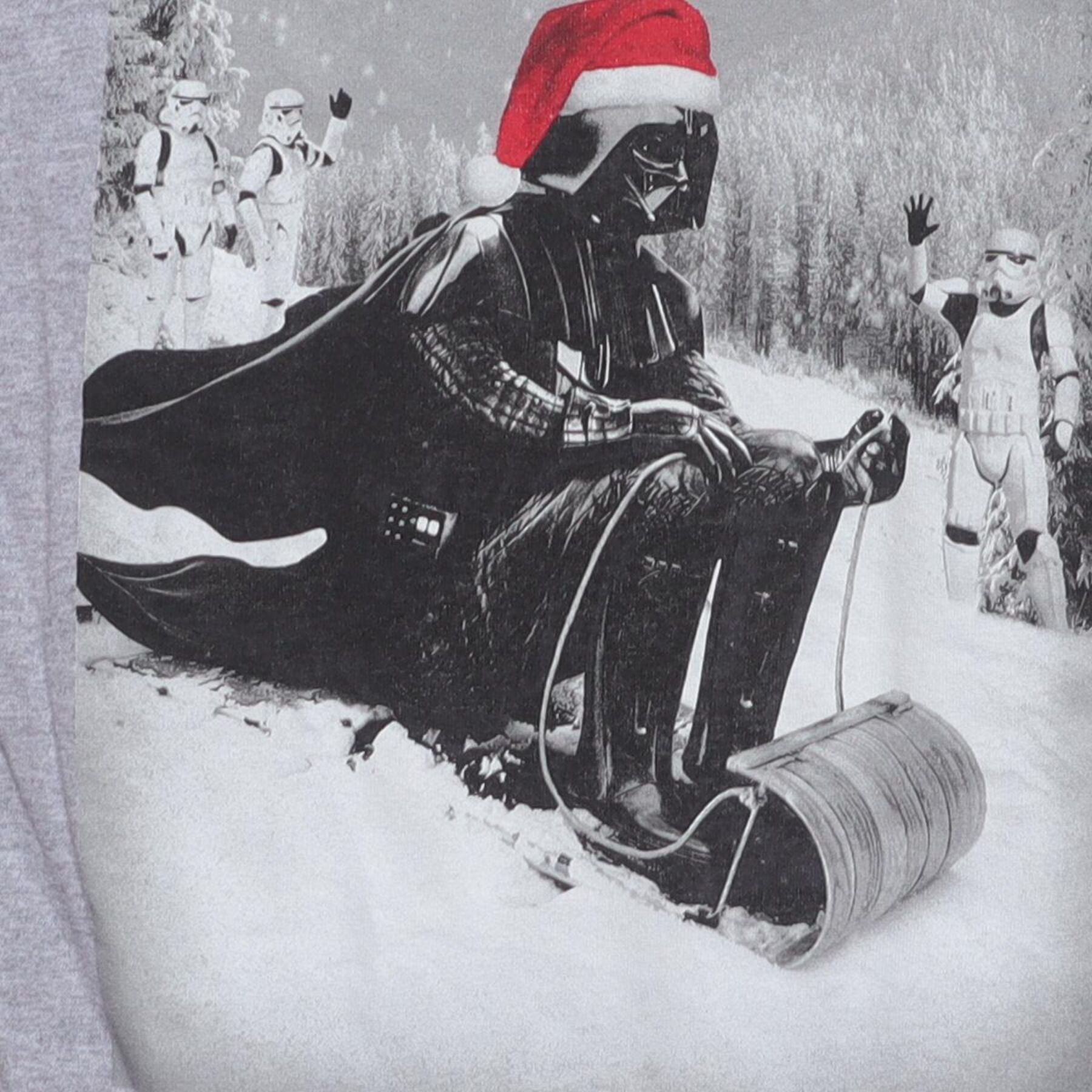 Close-up of the main graphic on the Vintage 2010s Star Wars "Darth Vader Sledding" T-Shirt - XS