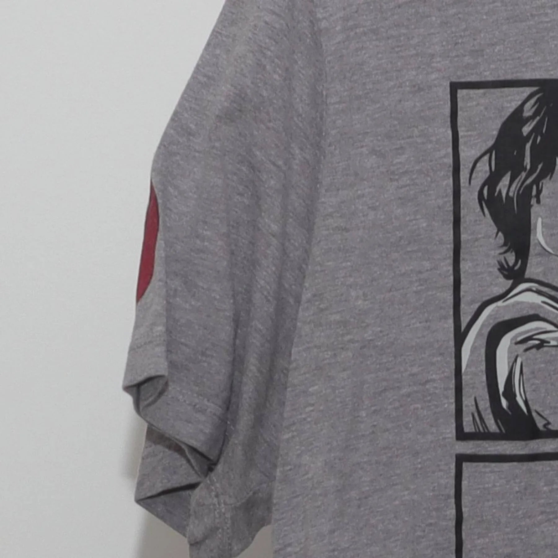 Close-up of the Left sleeve on the Vintage 2010s Star Wars "Rogue One Cast" T-Shirt - M