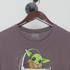 Close-up of the collar and tag on the Vintage 2010s Star Wars "Baby Yoda" T-Shirt - S