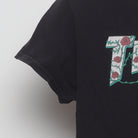 Close-up of the Left sleeve on the Vintage Y2K Thrasher Magazine "Roses Logo" T-Shirt - XS