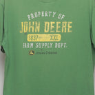 Close-up of the main graphic on the Vintage 00s John Deere Farm Supply Graphic T-Shirt L