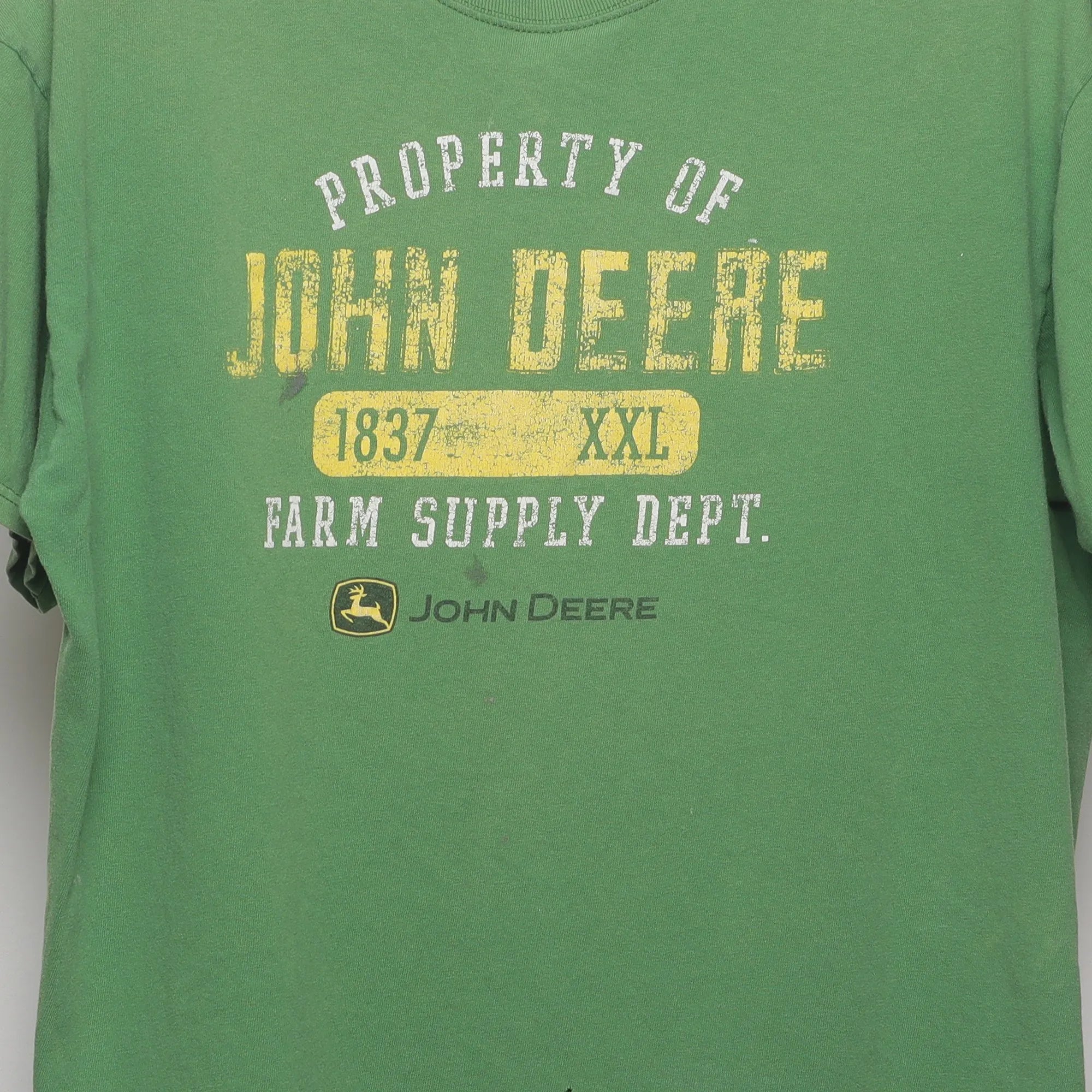Close-up of the main graphic on the Vintage 00s John Deere Farm Supply Graphic T-Shirt L