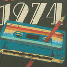 Close-up of the main graphic on the Vintage 1970s "Vintage 1974" Cassette Tape T-Shirt - S