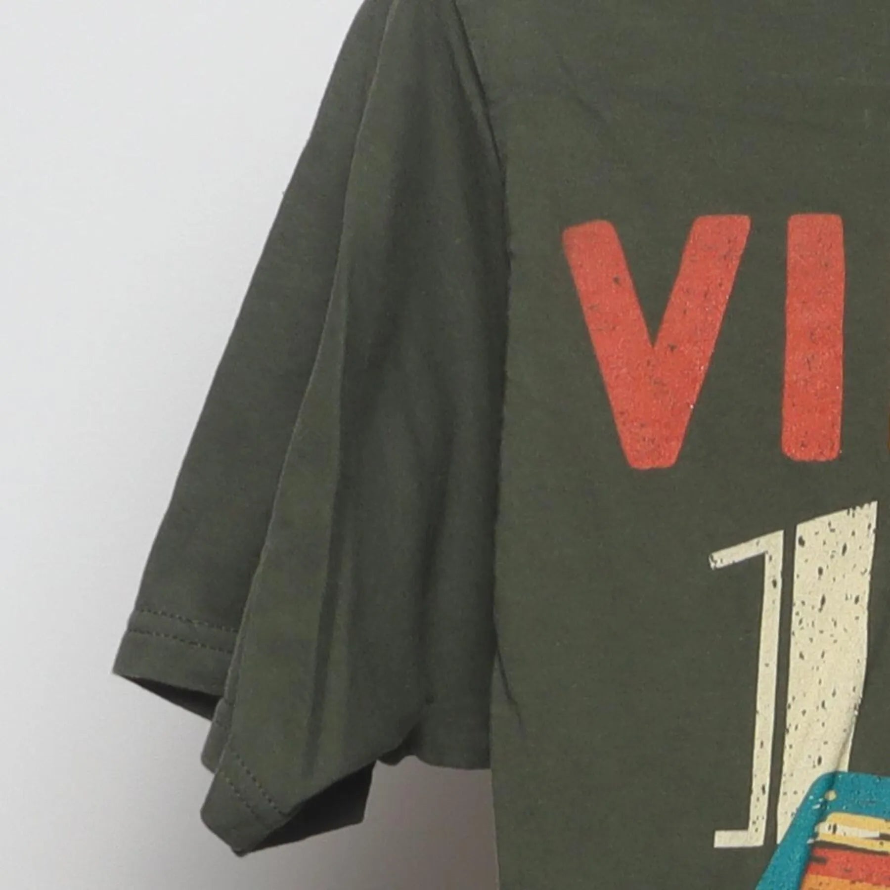 Close-up of the Left sleeve on the Vintage 1970s "Vintage 1974" Cassette Tape T-Shirt - S