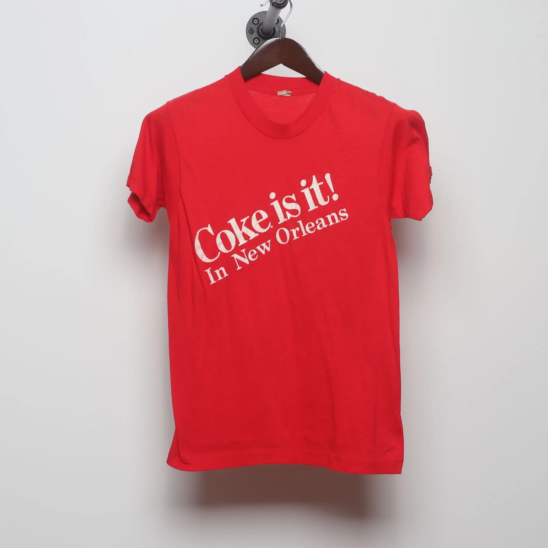 Front view of Vintage 1980s Coca-Cola "Coke is it! In New Orleans" T-Shirt - XS