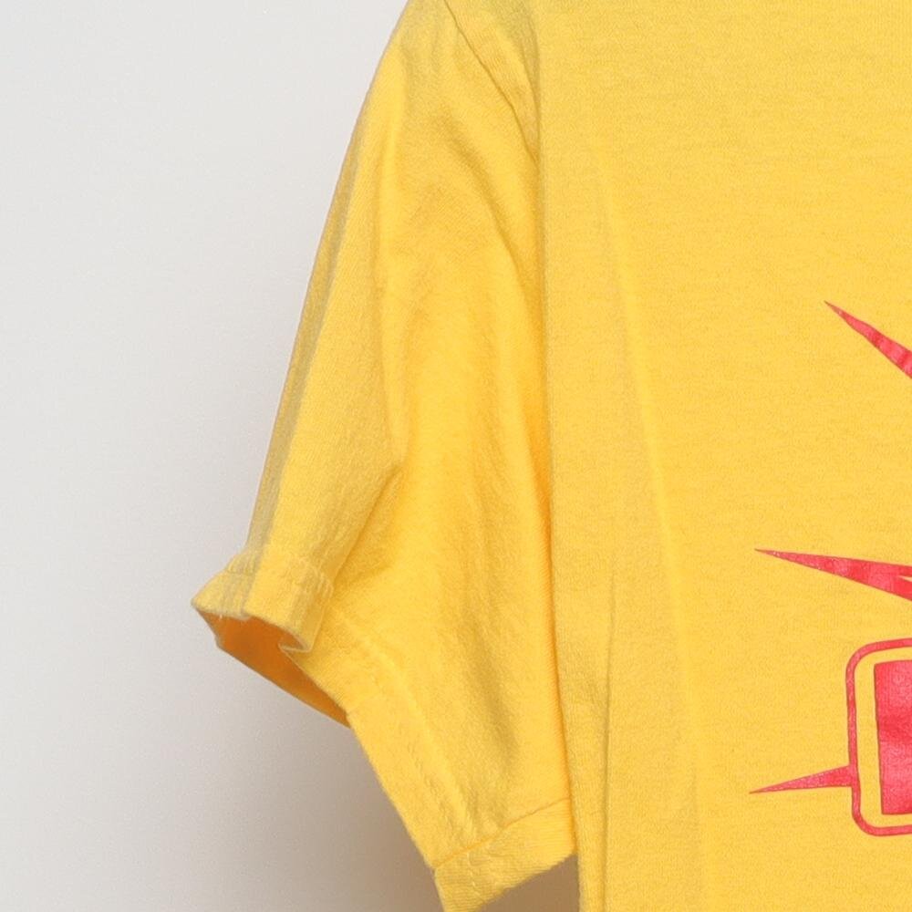 Close-up of the sleeve on the Vintage 1980s "Fireworks Staff" T-Shirt - M