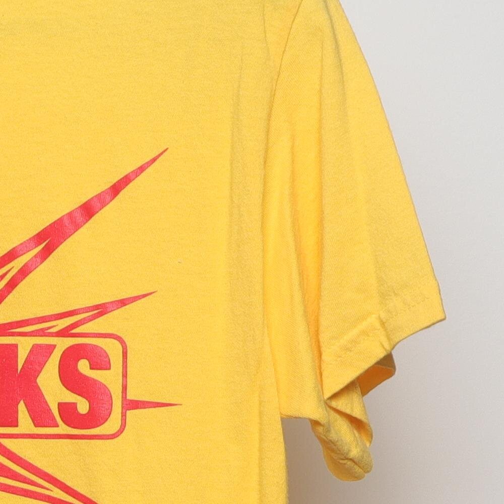 Close-up of the sleeve on the Vintage 1980s "Fireworks Staff" T-Shirt - M