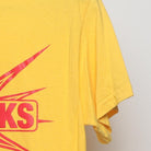Close-up of the sleeve on the Vintage 1980s "Fireworks Staff" T-Shirt - M