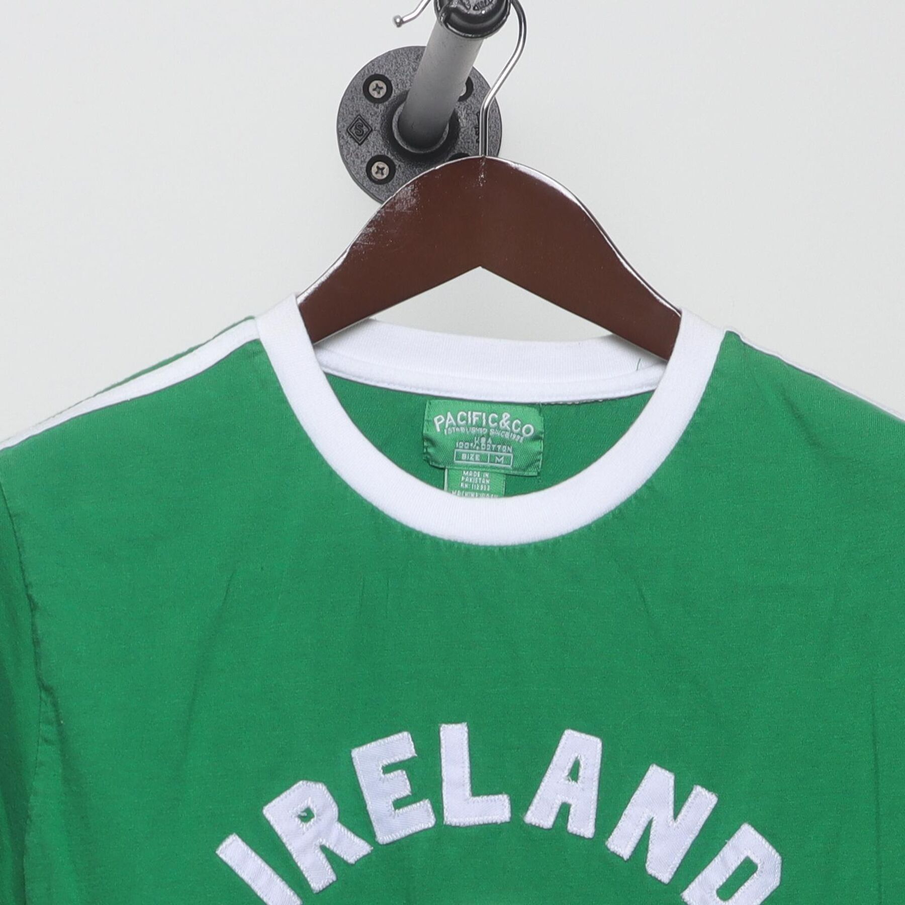 Close-up of the collar and tag on the Vintage 1980s FAI Ireland "Soccer Ringer" T-Shirt - S