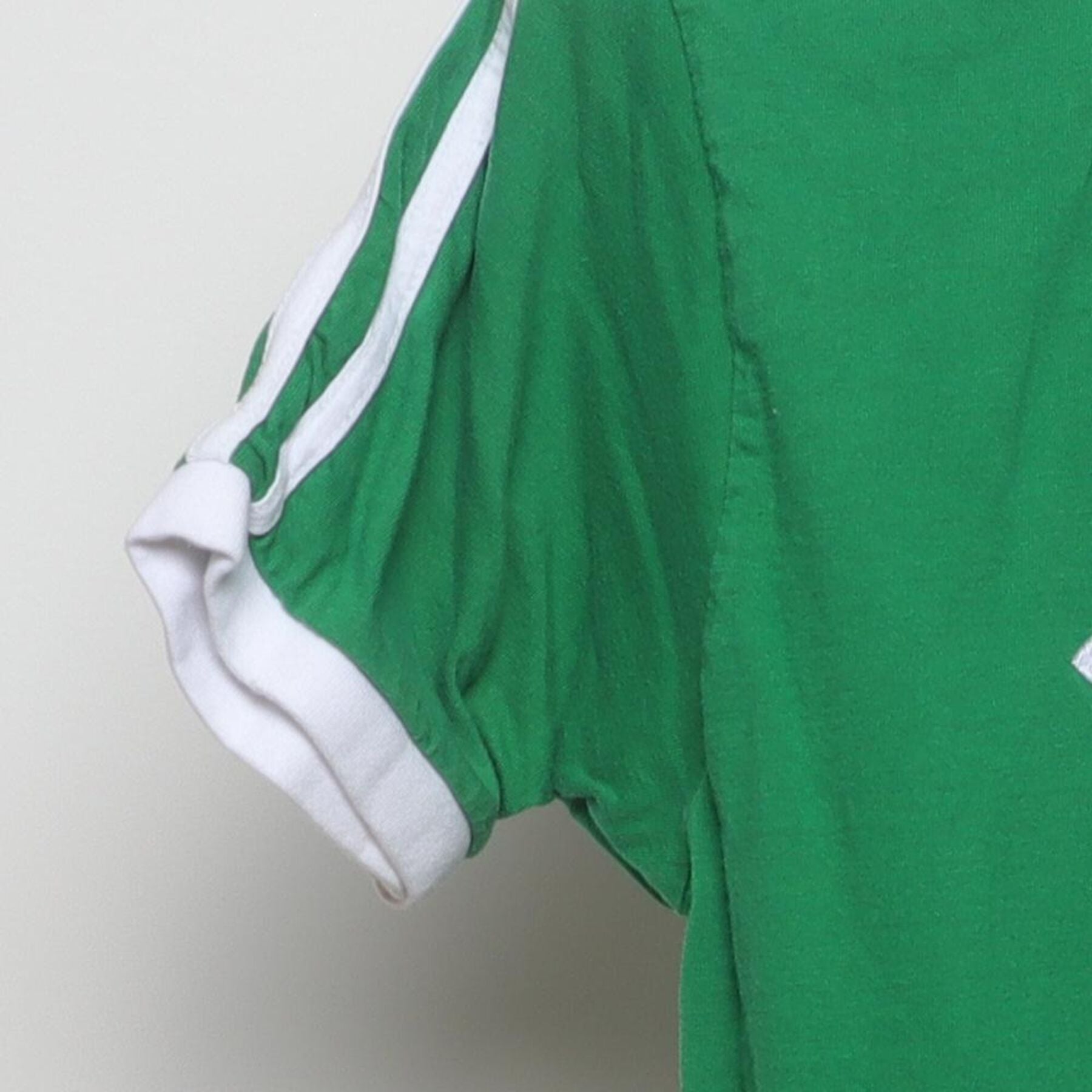 Close-up of the Left sleeve on the Vintage 1980s FAI Ireland "Soccer Ringer" T-Shirt - S