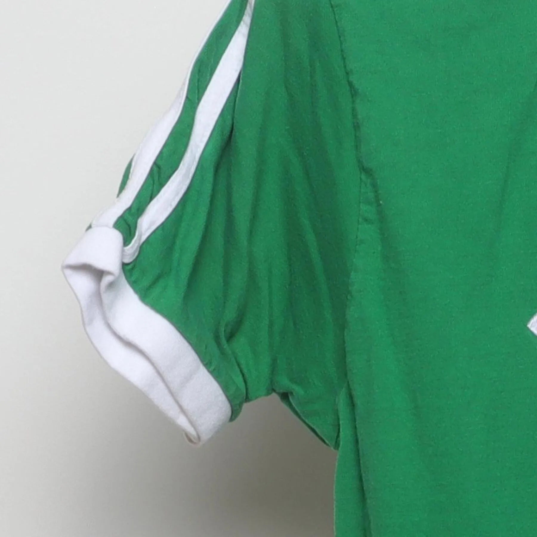 Close-up of the Left sleeve on the Vintage 1980s FAI Ireland "Soccer Ringer" T-Shirt - S