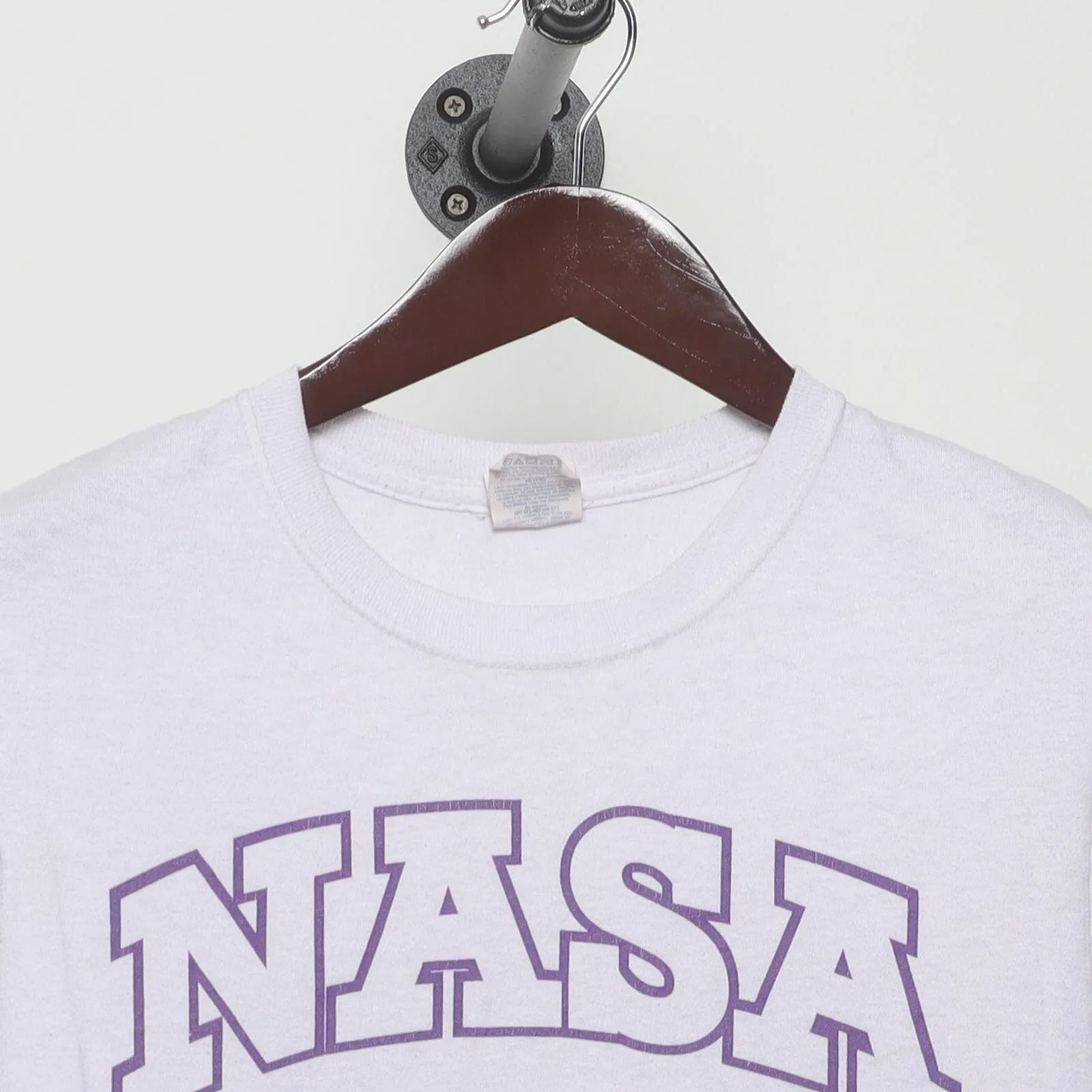Close-up of the collar and tag on the Vintage 1980s NASA "Volleyball Team" T-Shirt - S
