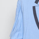 Close-up of the single stitch sleeve on the Vintage 1980s Roach "Tuxedo" T-Shirt - M