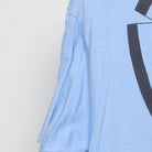 Close-up of the single stitch sleeve on the Vintage 1980s Roach "Tuxedo" T-Shirt - M