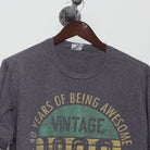 Close-up of the collar and tag on the Vintage 1982 40th Birthday Graphic T-Shirt L