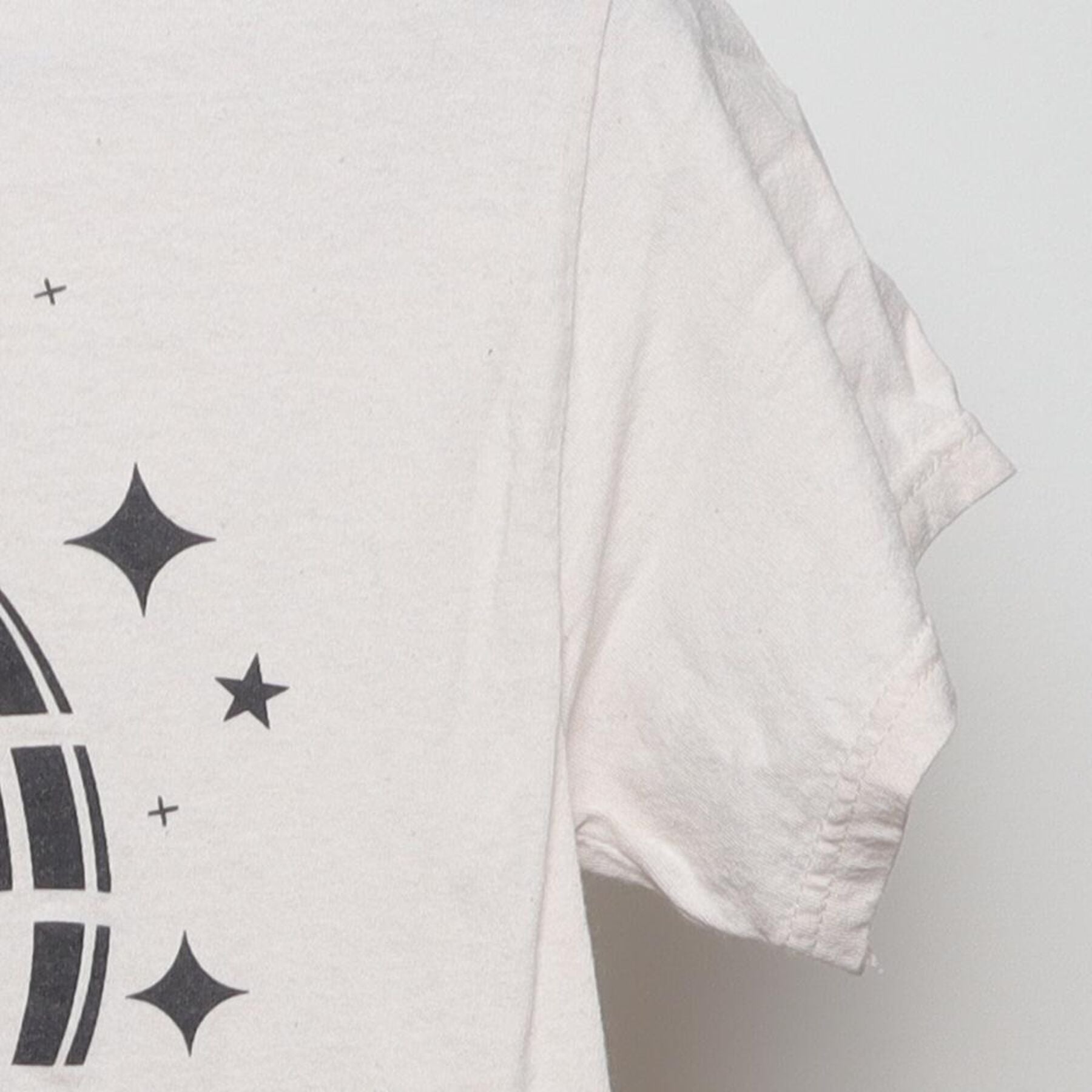 Close-up of the Right sleeve on the Vintage Y2K Disco Ball Graphic "It's A Good Good Good Good Time" T-Shirt - S