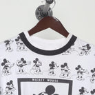 Close-up of the collar and tag on the Vintage 1990s Disney "Mickey Mouse All-Over Print" T-Shirt - L
