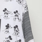 Close-up of the sleeve on the Vintage 1990s Disney "Mickey Mouse All-Over Print" T-Shirt - L