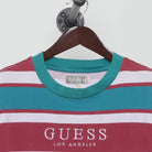 Close-up of the collar and tag on the Vintage 1990s Guess "Striped Logo" T-Shirt - XL