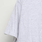 Close-up of the sleeve on the Vintage 1990s Harley-Davidson "HMS Rose" T-Shirt - L