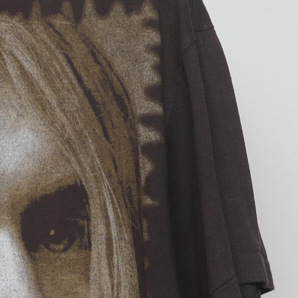 Close-up of the sleeve on the Vintage 1990s Kurt Cobain "A Cry in the Dark" Memorial T-Shirt - XL