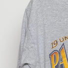Close-up of the sleeve on the Vintage 1990s Michigan Wolverines "1997 Undefeated to Pasadena" T-Shirt - L