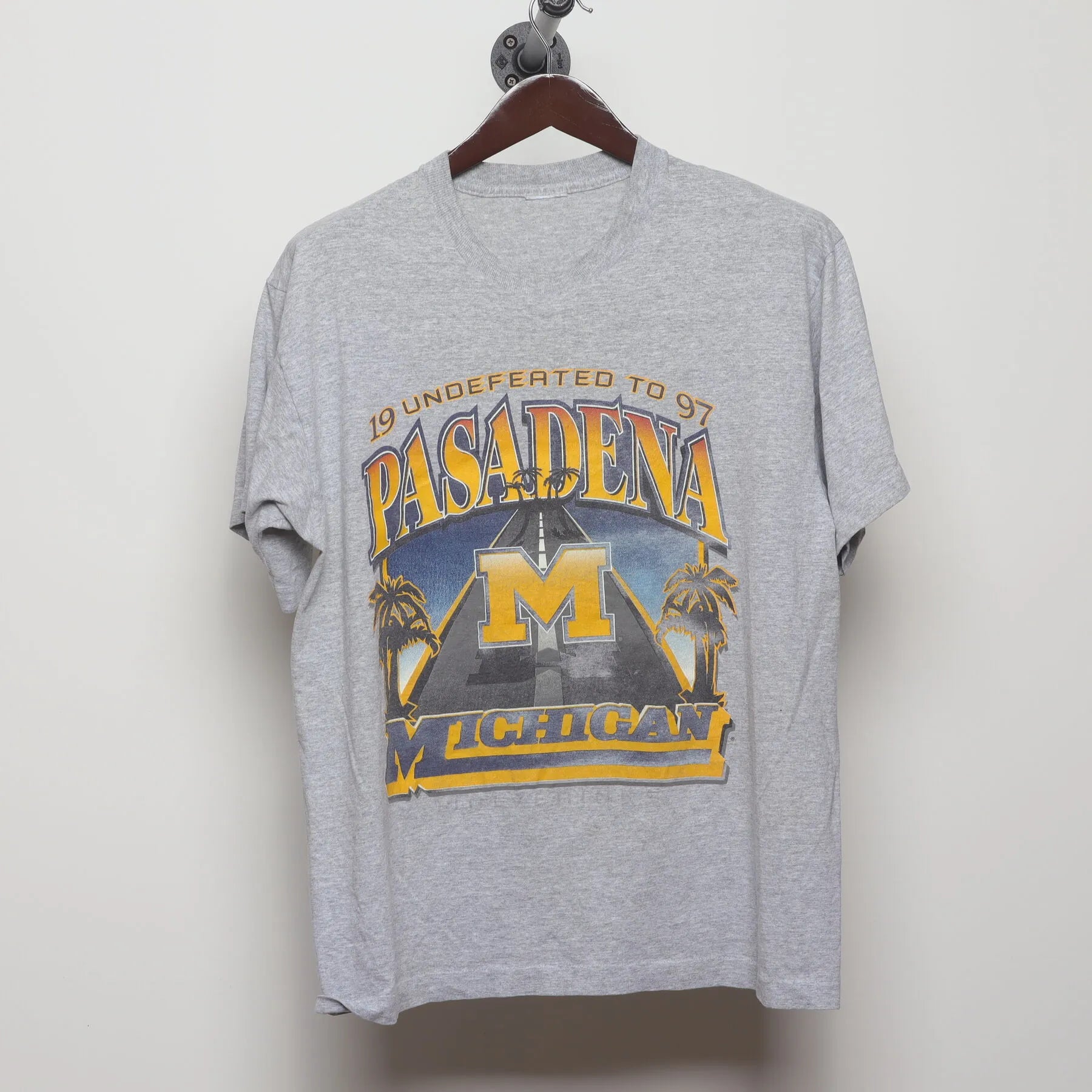Front view of Vintage 1990s Michigan Wolverines "1997 Undefeated to Pasadena" T-Shirt - L