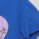 Close-up of the sleeve on the Vintage 1990s Nickelodeon "Rocko and Spunky" T-Shirt - L
