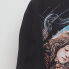 Close-up of the sleeve on the Vintage 1990s Nirvana "Angst" T-Shirt - XL
