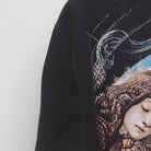 Close-up of the sleeve on the Vintage 1990s Nirvana "Angst" T-Shirt - XL