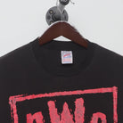 Close-up of the collar and tag on the Vintage 1990s nWo "Bad Has Arrived" T-Shirt - XL