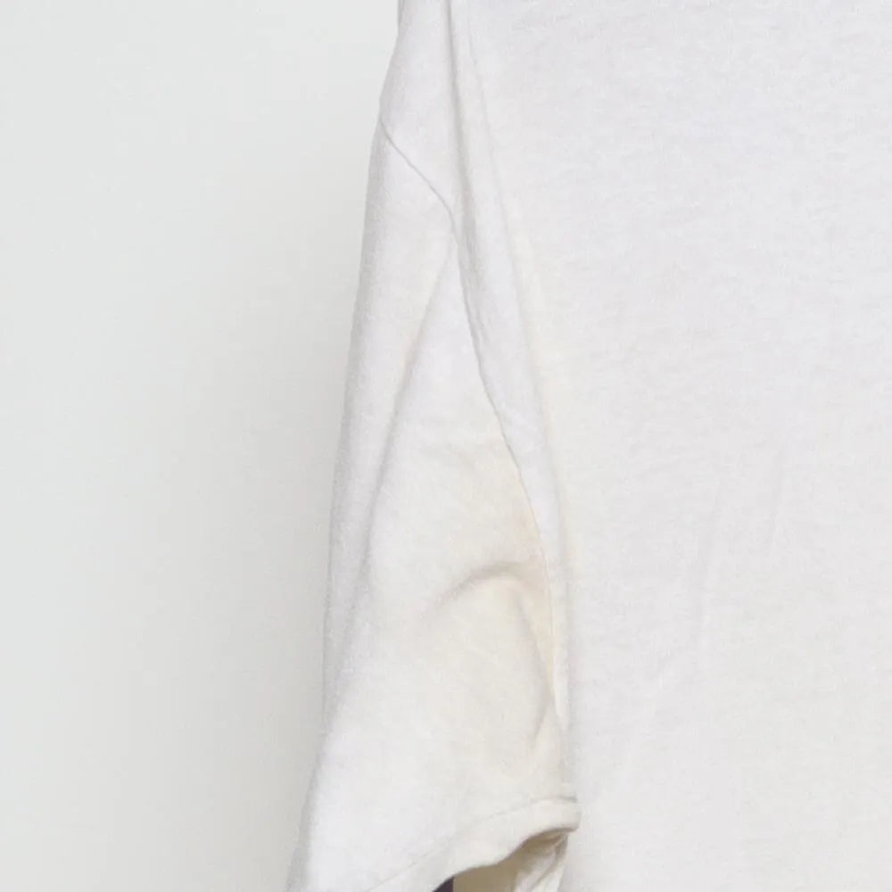 Close-up of the sleeve on the Vintage 1990s Russell Athletic "Army ROTC" T-Shirt - XL