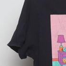 Close-up of the sleeve on the Vintage 1990s The Simpsons "Couch Gag" T-Shirt - S