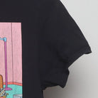 Close-up of the sleeve on the Vintage 1990s The Simpsons "Couch Gag" T-Shirt - S