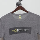Close-up of the collar and tag on the Vintage 2000s 30 Rock TV Show Promo T-Shirt M