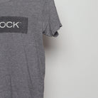 Close-up of the sleeve on the Vintage 2000s 30 Rock TV Show Promo T-Shirt M