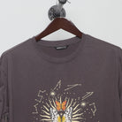 Close-up of the collar and tag on the Vintage 2000s Celestial Butterfly Graphic Tee M