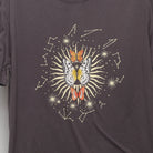 Close-up of the main graphic on the Vintage 2000s Celestial Butterfly Graphic Tee M