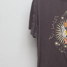 Close-up of the sleeve on the Vintage 2000s Celestial Butterfly Graphic Tee M