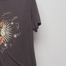 Close-up of the sleeve on the Vintage 2000s Celestial Butterfly Graphic Tee M