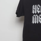 Close-up of the sleeve on the Vintage 2000s Heavy Metal Graphic T-Shirt M