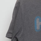 Close-up of the Left sleeve on the Vintage Y2K Homage x Howies Hockey Tape "Mascot Logo" T-Shirt - L