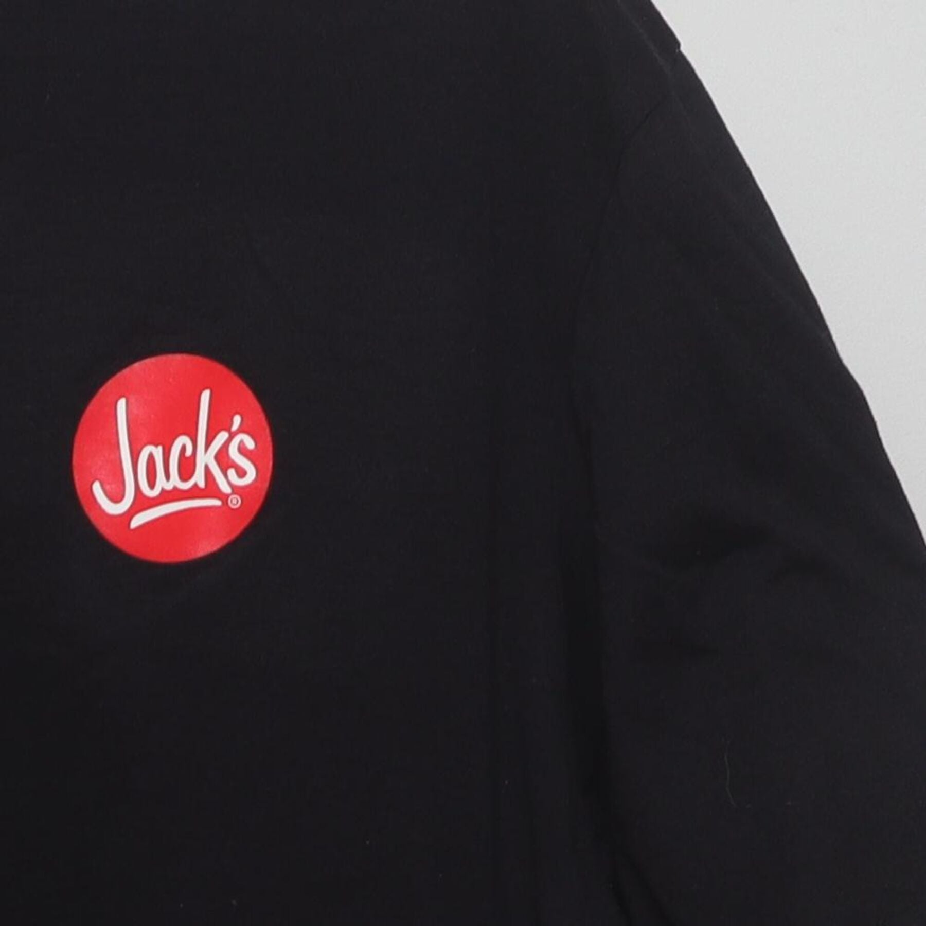 Close-up of the single stitch sleeve on the Vintage 2000s Jack's "All About The South" T-Shirt - L