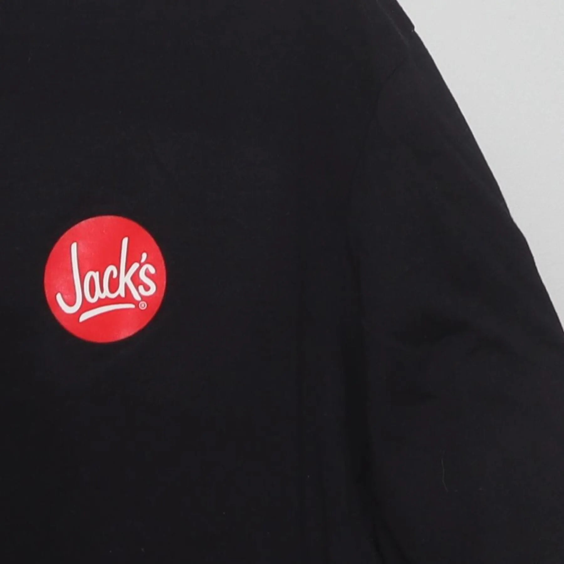 Close-up of the single stitch sleeve on the Vintage 2000s Jack's "All About The South" T-Shirt - L