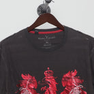 Close-up of the collar and tag on the Vintage 2000s Marc Ecko Foil Eagle T-Shirt XL