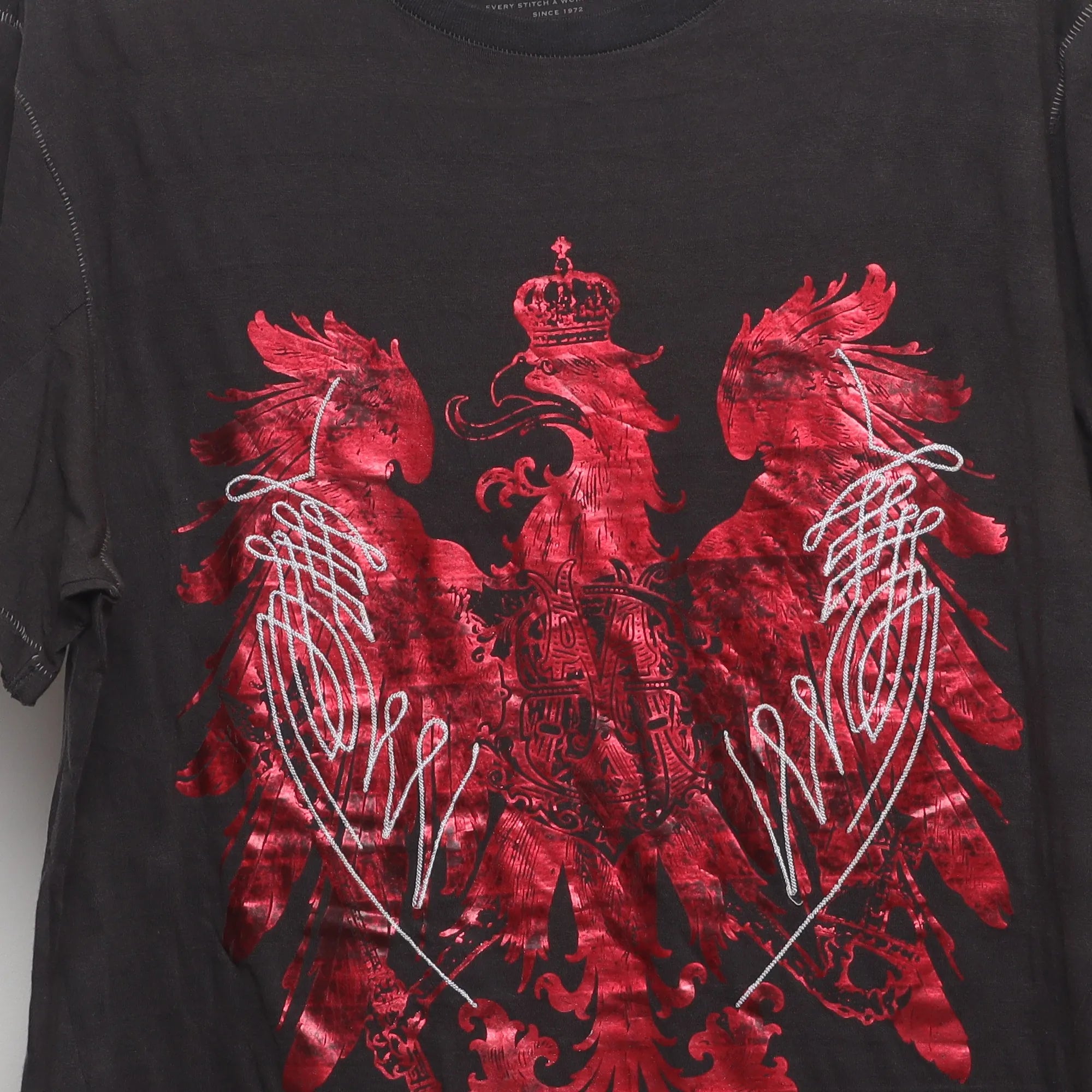 Close-up of the main graphic on the Vintage 2000s Marc Ecko Foil Eagle T-Shirt XL